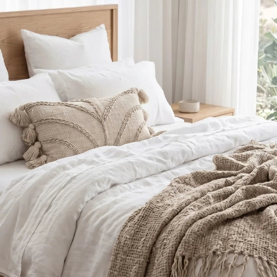 Chloe Shell Embossed Cushion Cover on on modern coastal boho styled bedroom by Sun Republic