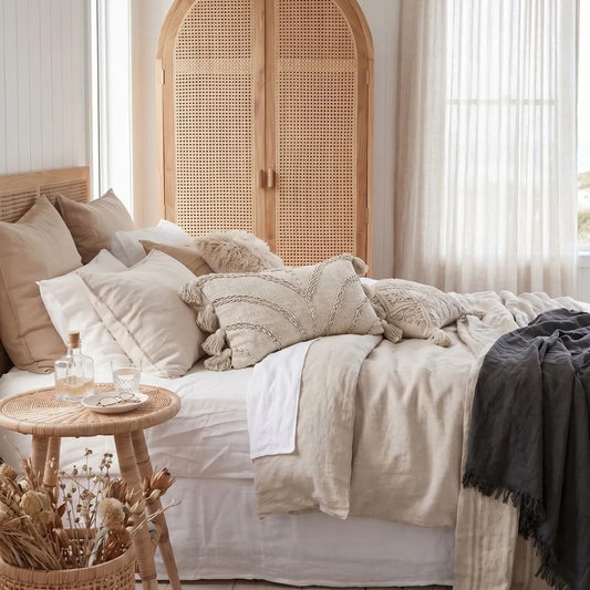 Chloe Shell Embossed Cushion Cover on on modern coastal boho styled bedroom by Sun Republic