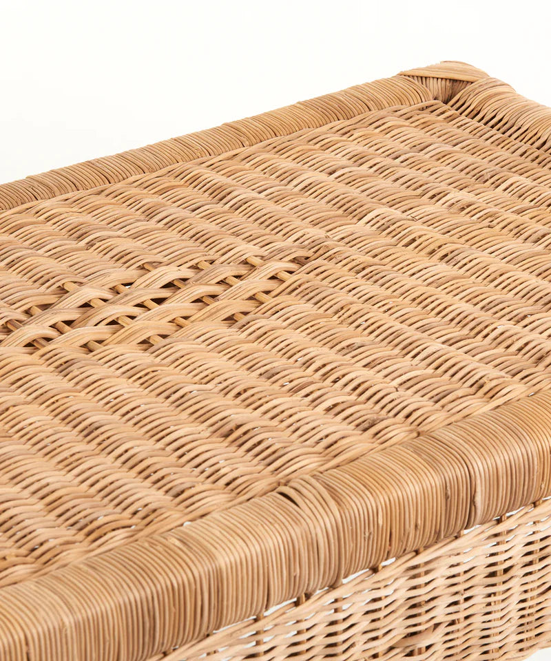 Close-up of a woven wicker basket lid on a white background
