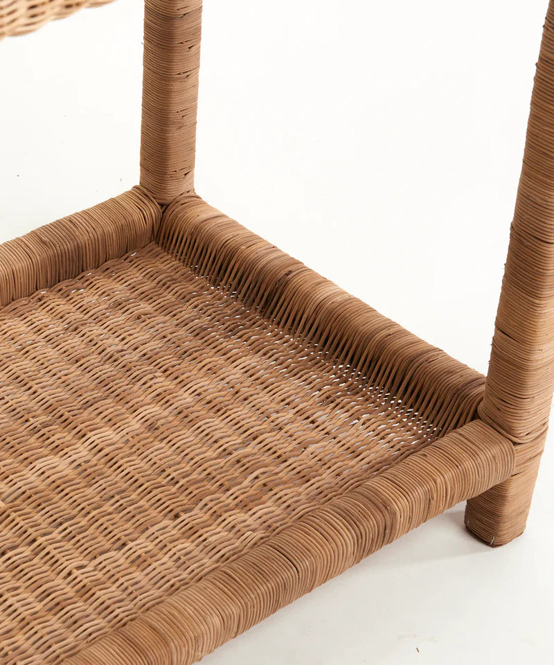 Close-up of a woven chair seat and backrest on a white background