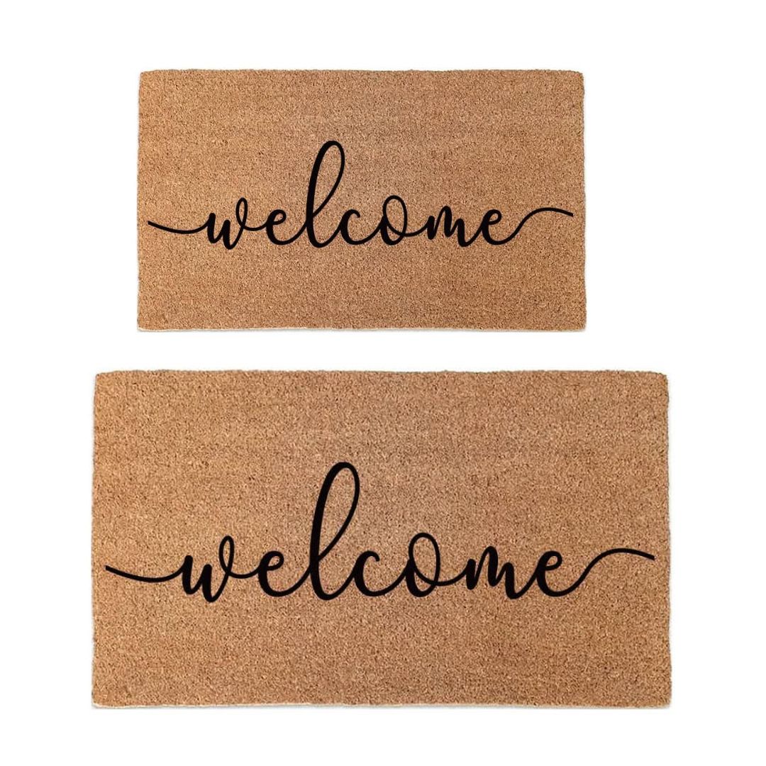 Two brown doormats with 'welcome' text on a white background