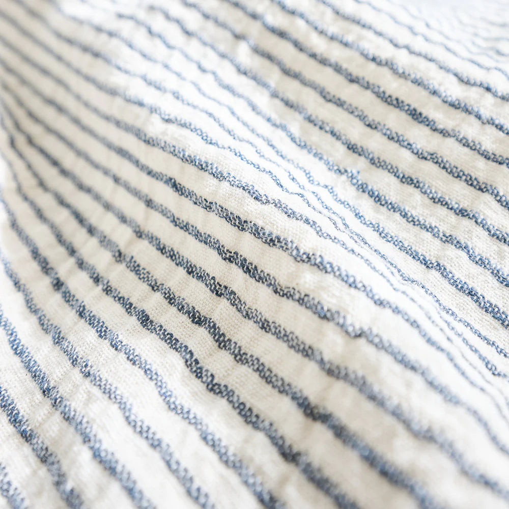 Cotton duvet cover in white and ink blue pin stripe.