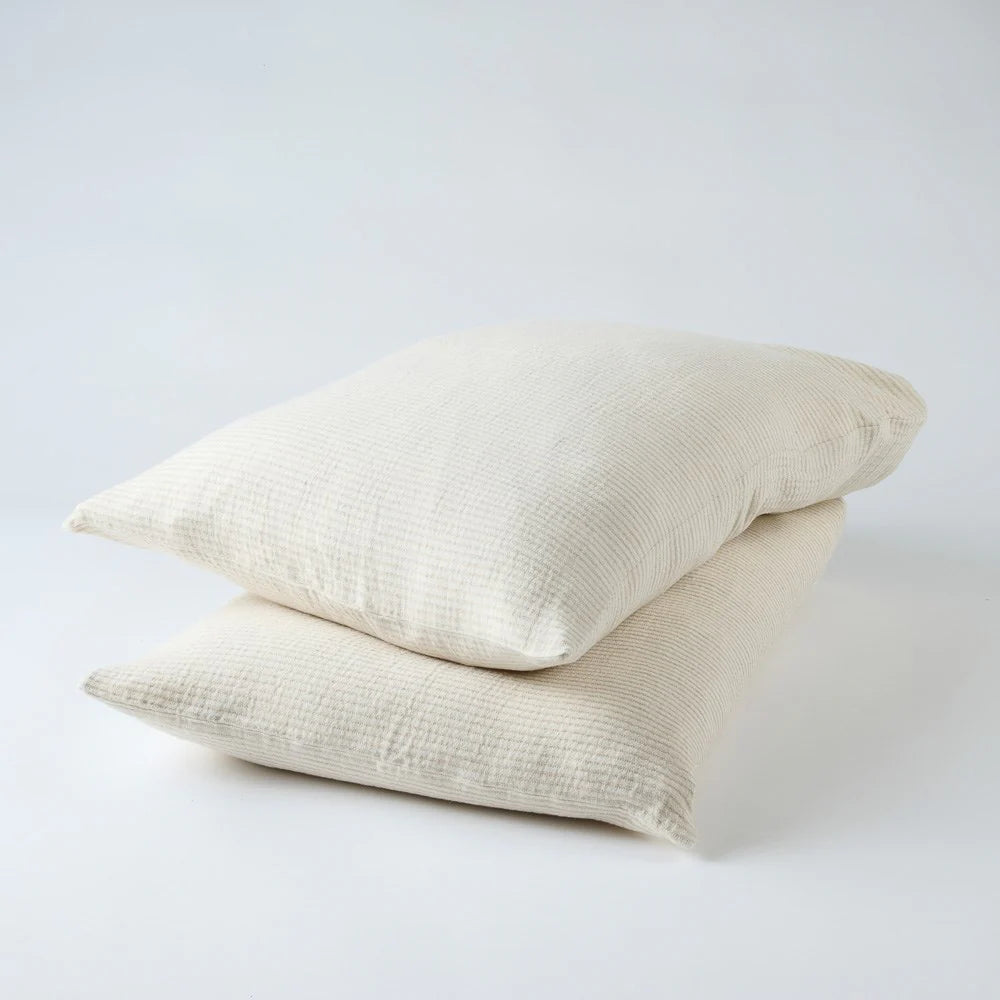 Two natural pinstripe pillowscases