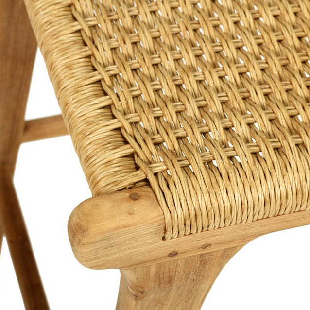 Close-up of a wicker chair seat on a white background