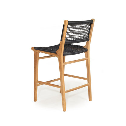 A wooden bar stool with a natural oak frame and black woven rope seat and backrest, shown from a three-quarter angle on a white background.