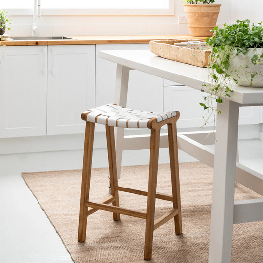 Teak and white woven leather bar stool with Eco floor rug in a kitchen setting from Sun Republic