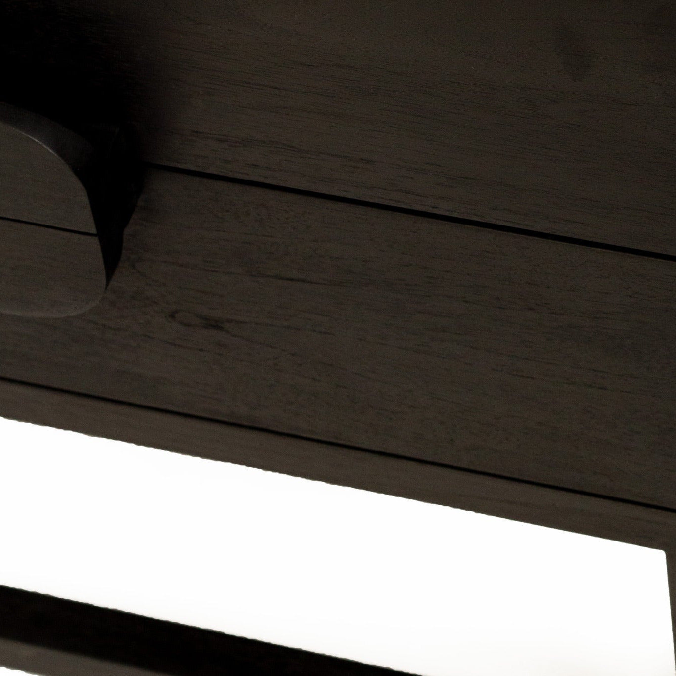 Dark wooden chair with a white background