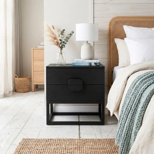 Flynn Matte Black bedside table in a modern bedroom setting