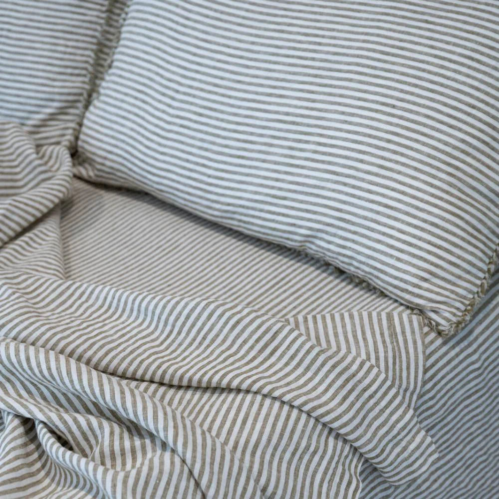Close-up of striped fabric with a focus on texture and pattern.