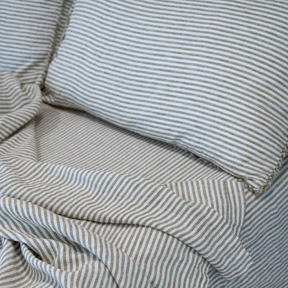 Close-up of striped fabric with a focus on texture and pattern.