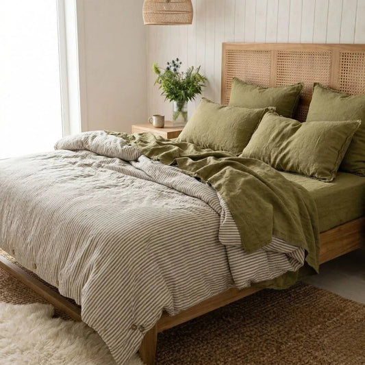 Bedroom with a wooden bed and green bedding