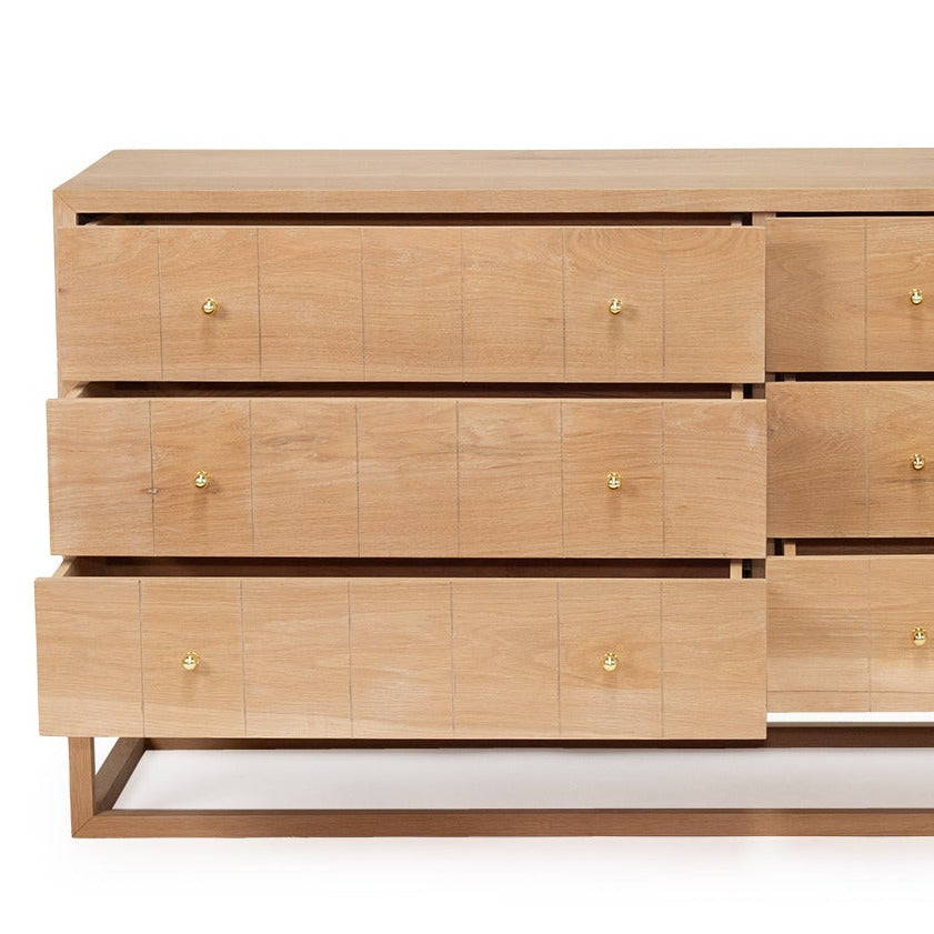 Close up details of the Freya American Oak chest of drawer on a white background by Sun Republic