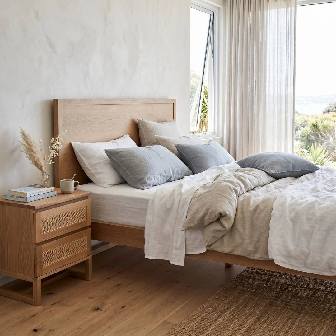 Freya American Oak bed in a modern bedroom setting.