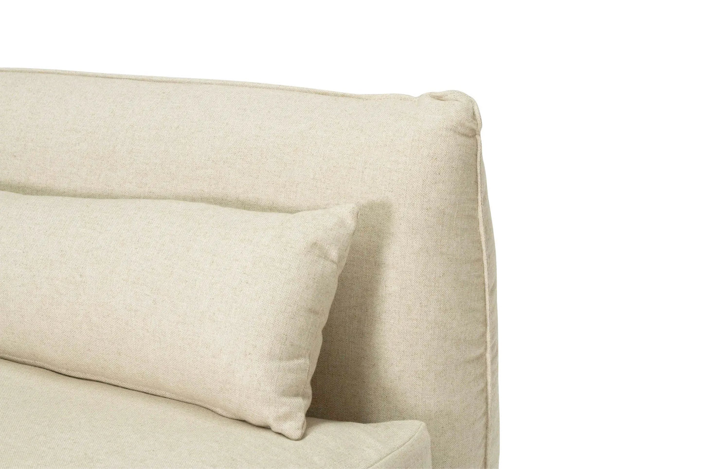 Beige sofa with a pillow on a white background