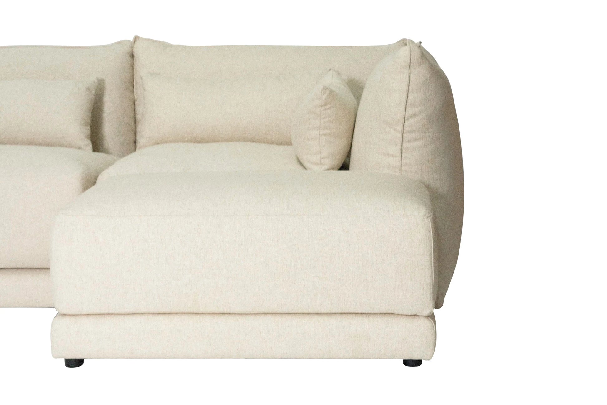 Beige linen sectional sofa on a white background