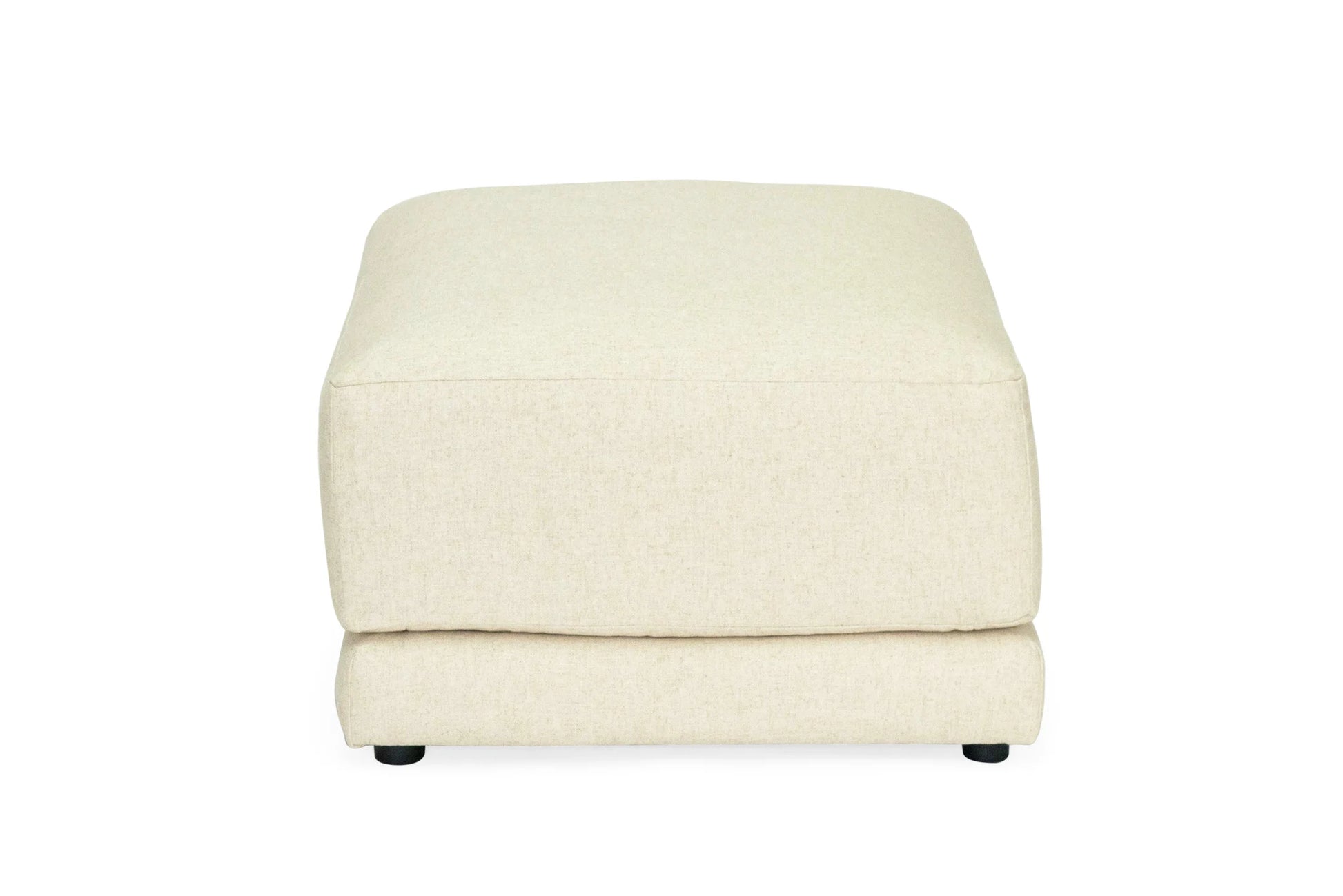 Light beige linen ottoman on a white background