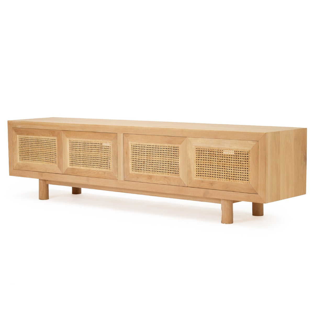 A mid-century modern wooden sideboard with three front panels featuring woven cane inserts, supported by four short legs, shown on a plain white background.