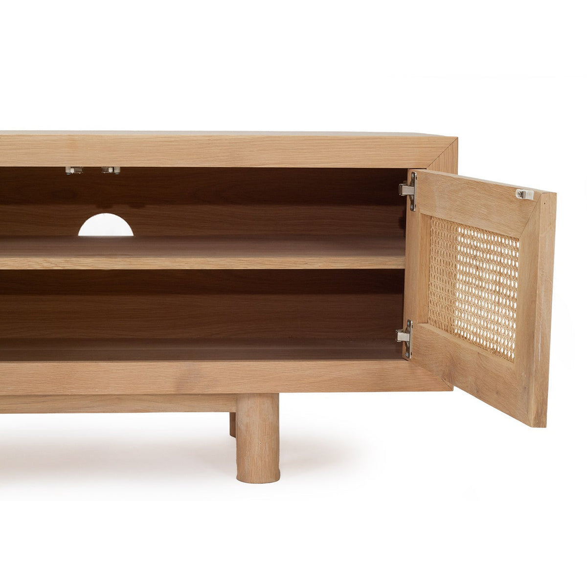 A light natural wood media cabinet with an open door showing a woven cane panel on the right side, set against a plain white background.