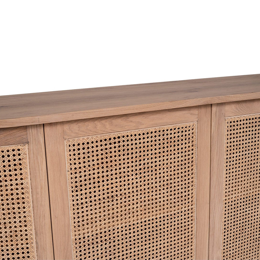 Wooden cabinet with rattan-style doors on a white background