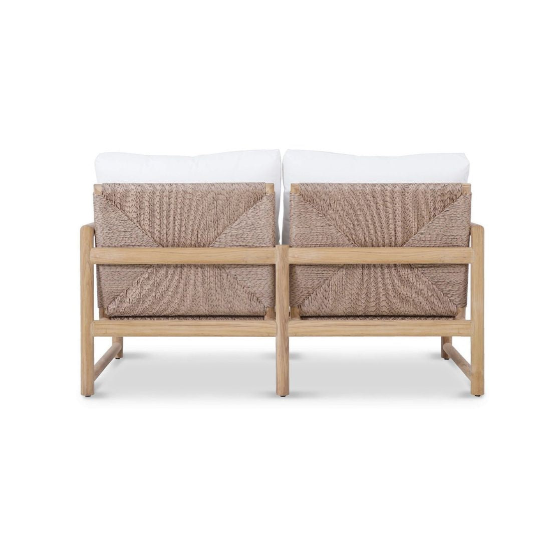 Two-seater outdoor sofa with woven backrests and white cushions on a white background