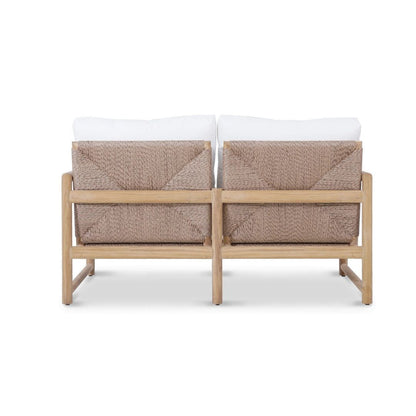 Two-seater outdoor sofa with woven backrests and white cushions on a white background