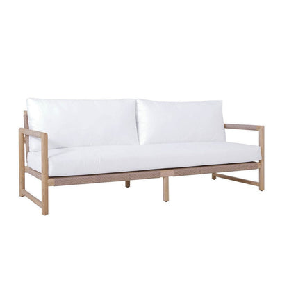 Beige outdoor sofa with white cushions on a white background