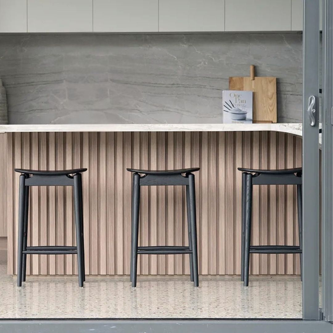 Sun Republic Black Jansen counter stools in a modern kitchen