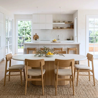 Modern kitchen and dining area with Sun Republic Jansen Collection Dining Table, chairs and stools.