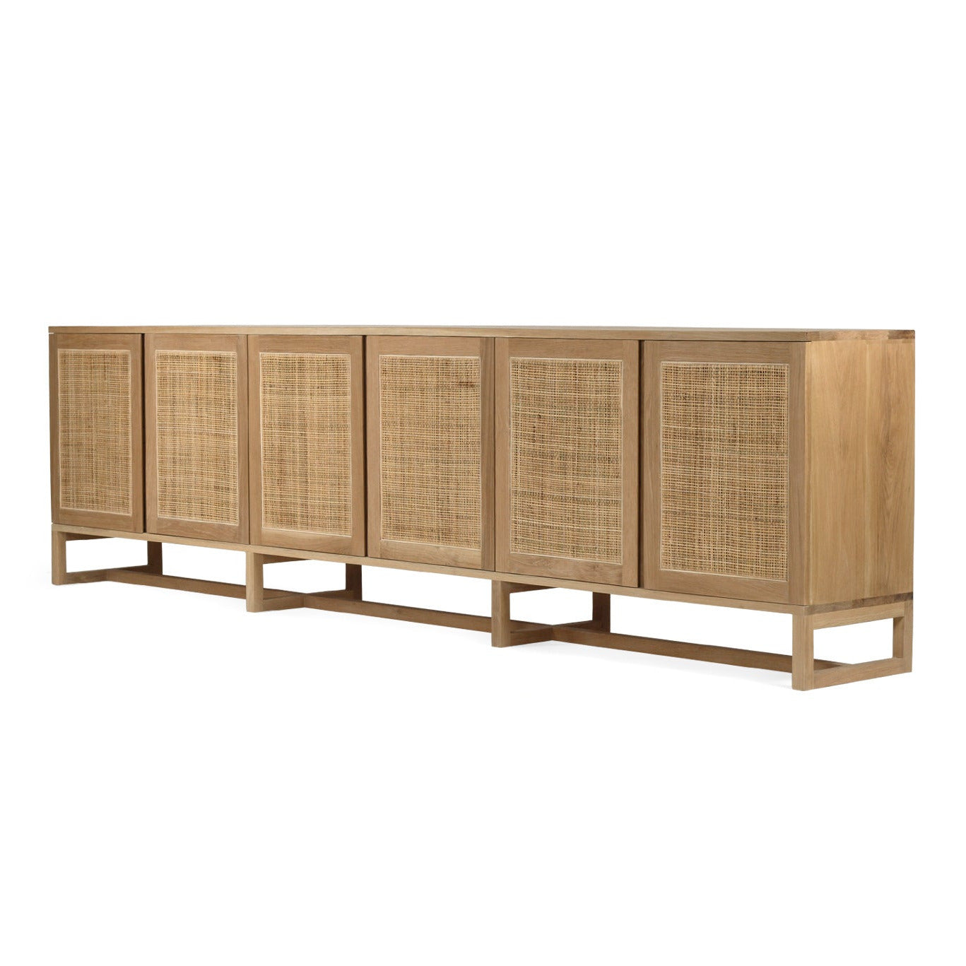 Wooden sideboard with rattan doors on a white background