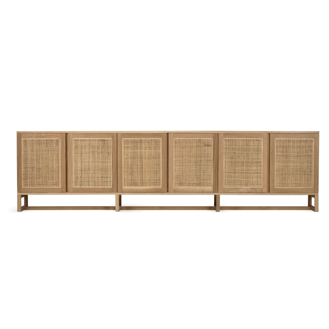 Wicker sideboard with multiple doors on a white background