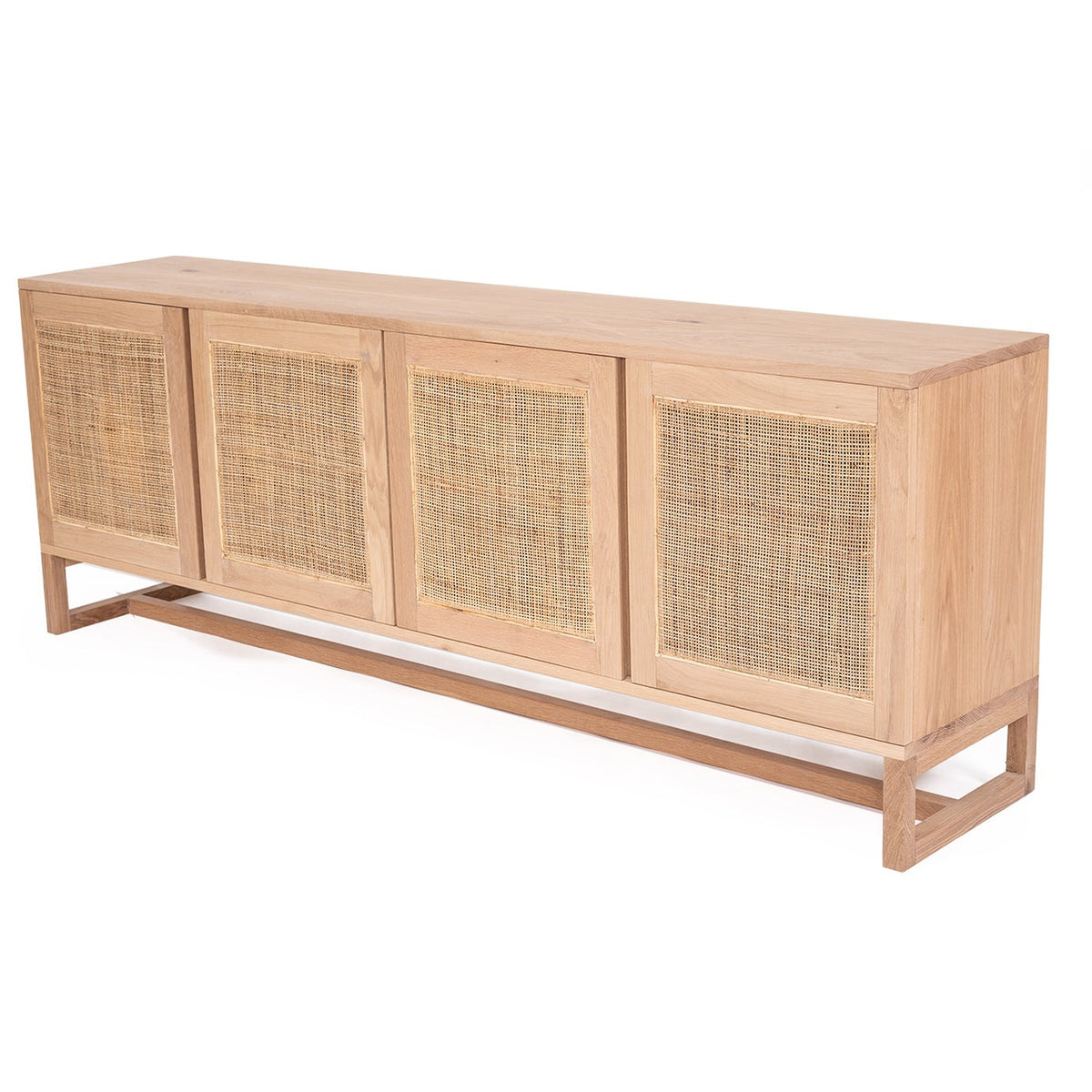 Wooden sideboard with rattan doors on a white background
