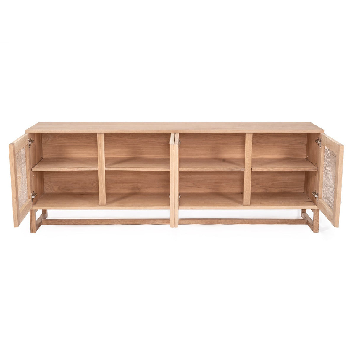 Wooden sideboard with open doors on a white background