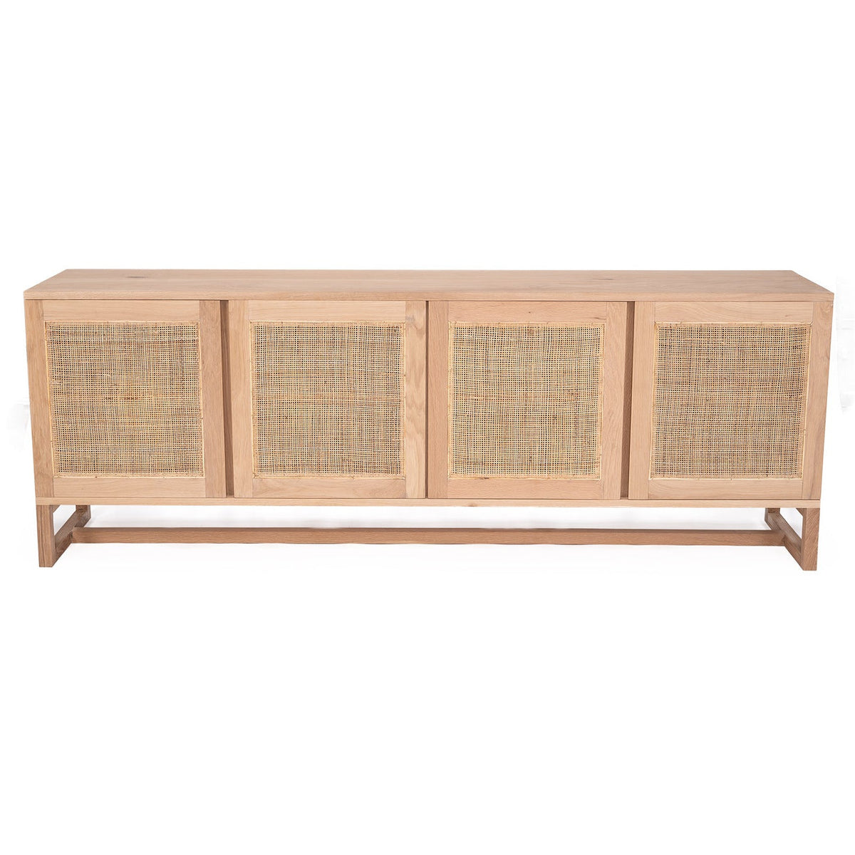 Wooden sideboard with rattan doors on a white background