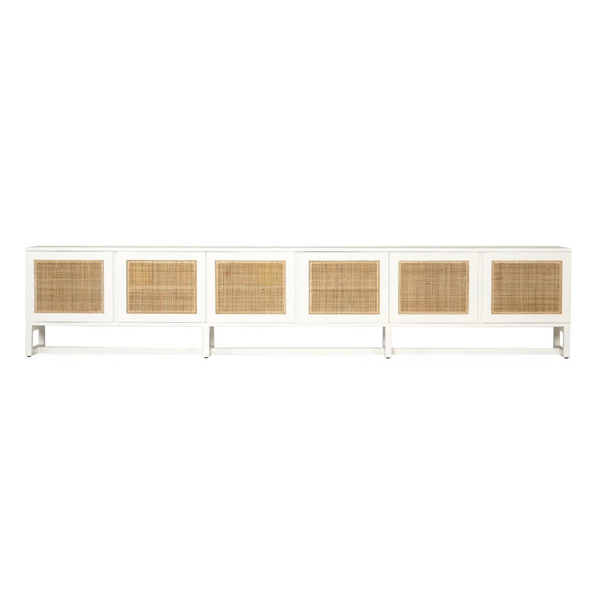 Product image of long white entertainment unit with six rectangular woven cane or rattan panels on the front, shown against a plain white background.