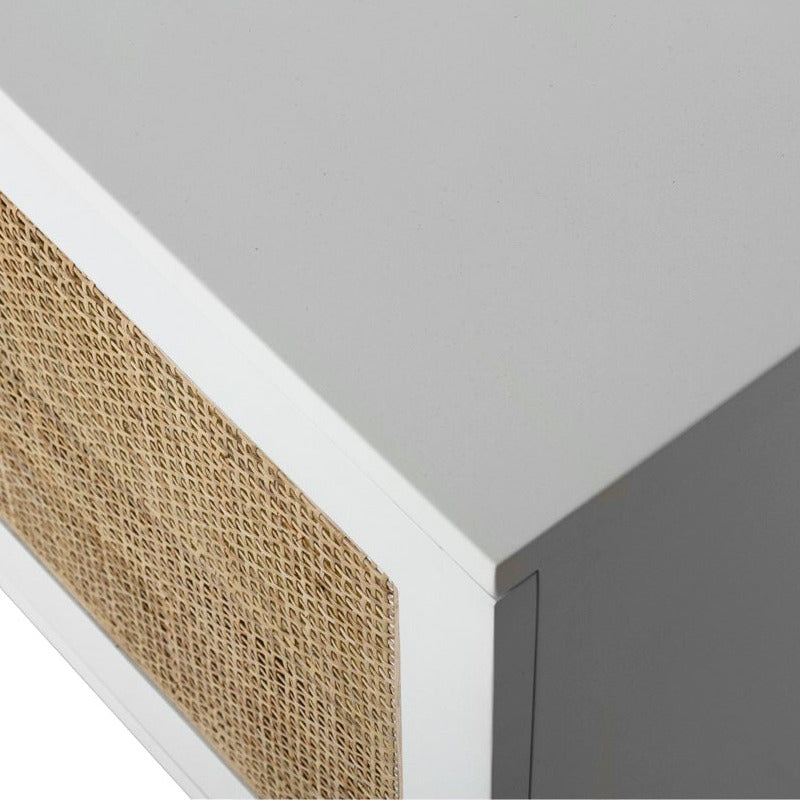Product image of long white entertainment unit with six rectangular woven cane or rattan panels on the front, shown against a plain white background.
