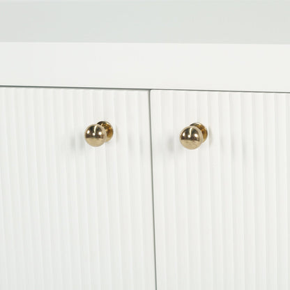 White cabinet with gold knobs on a white background