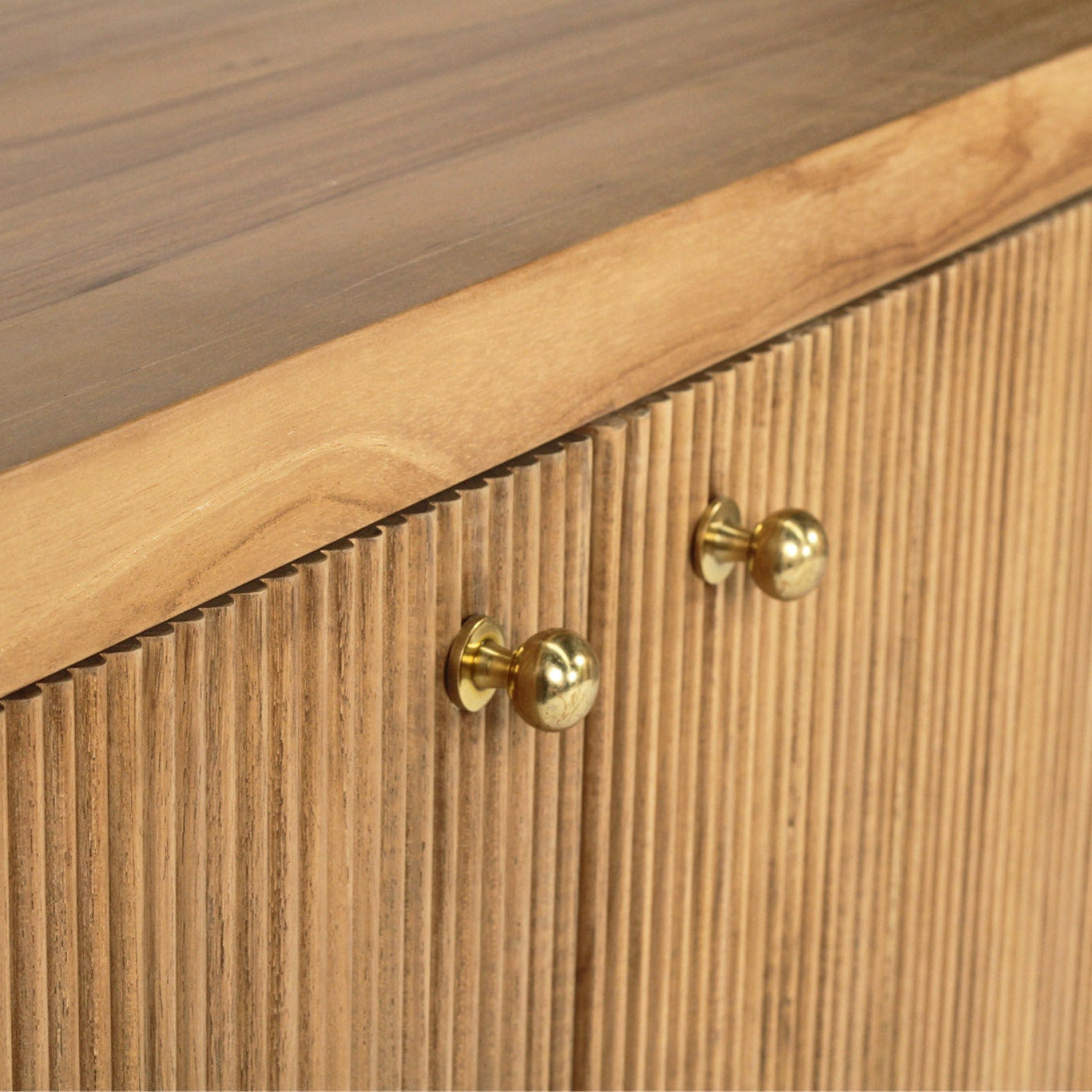 Wooden furniture with gold handles