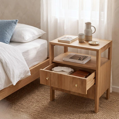 Natural teak bedside table in a modern bedroom setting