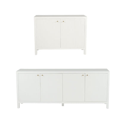 Two white sideboards with gold handles on a white background