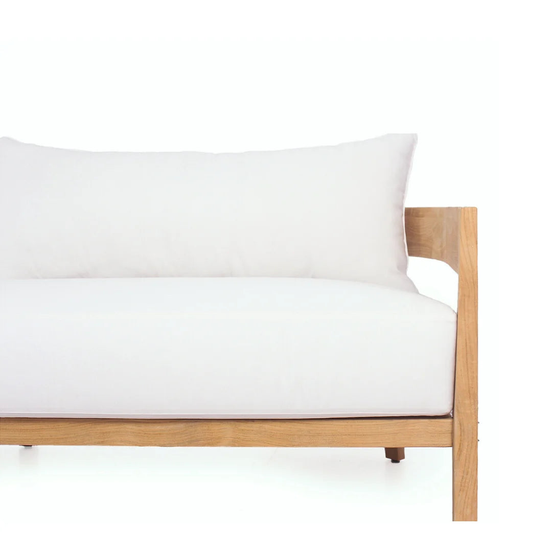 Wooden  frame with white cushion on a white background