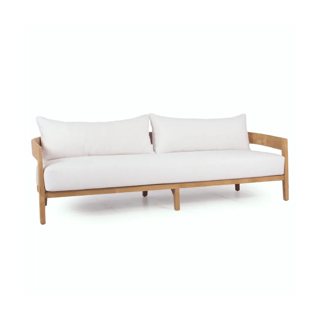 Sofa with white cushions and wooden frame on a white background