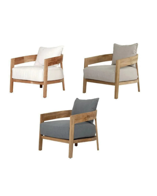 Three wooden armchairs with different colored cushions on a white background