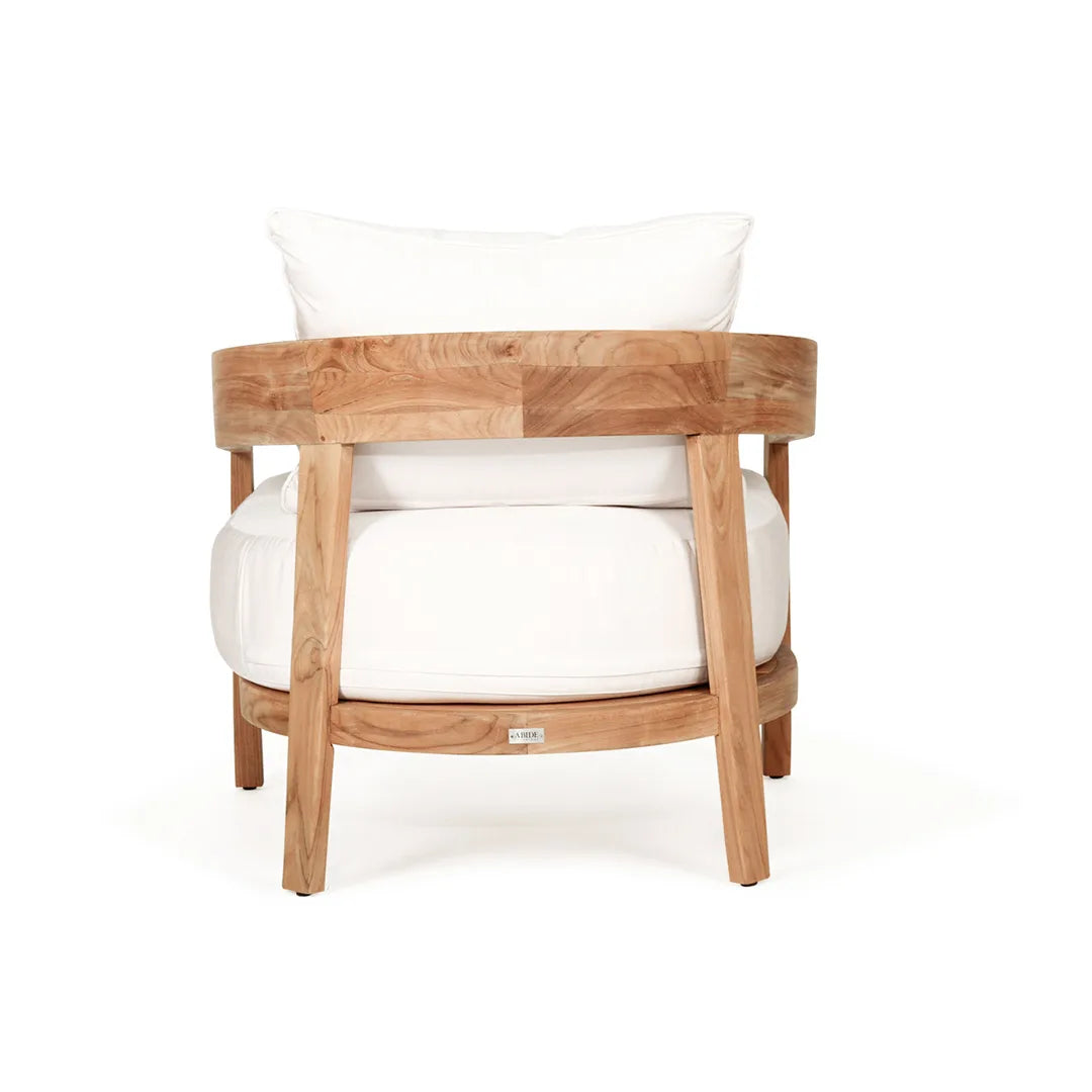 Teak outdoor armchair with white cushions on a white background