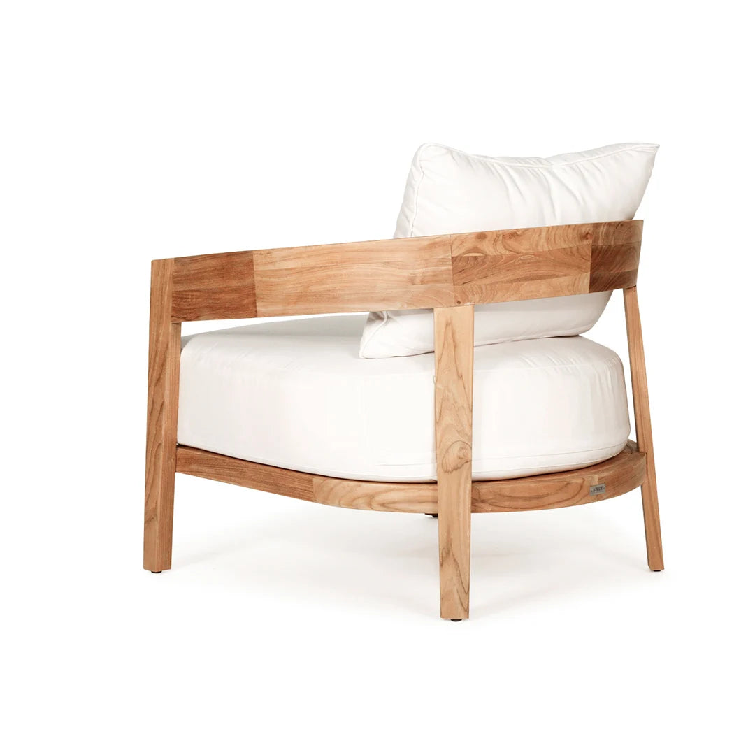 Teak outdoor armchair with white cushions on a white background