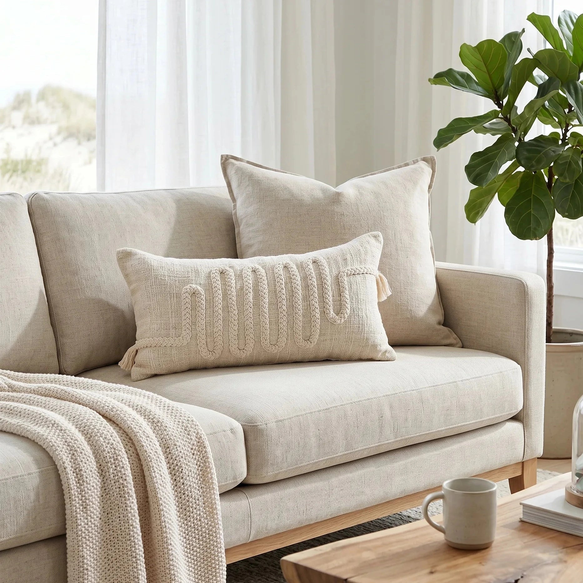 Modern coastal loungeroom featuring Sun Republic layla cushion