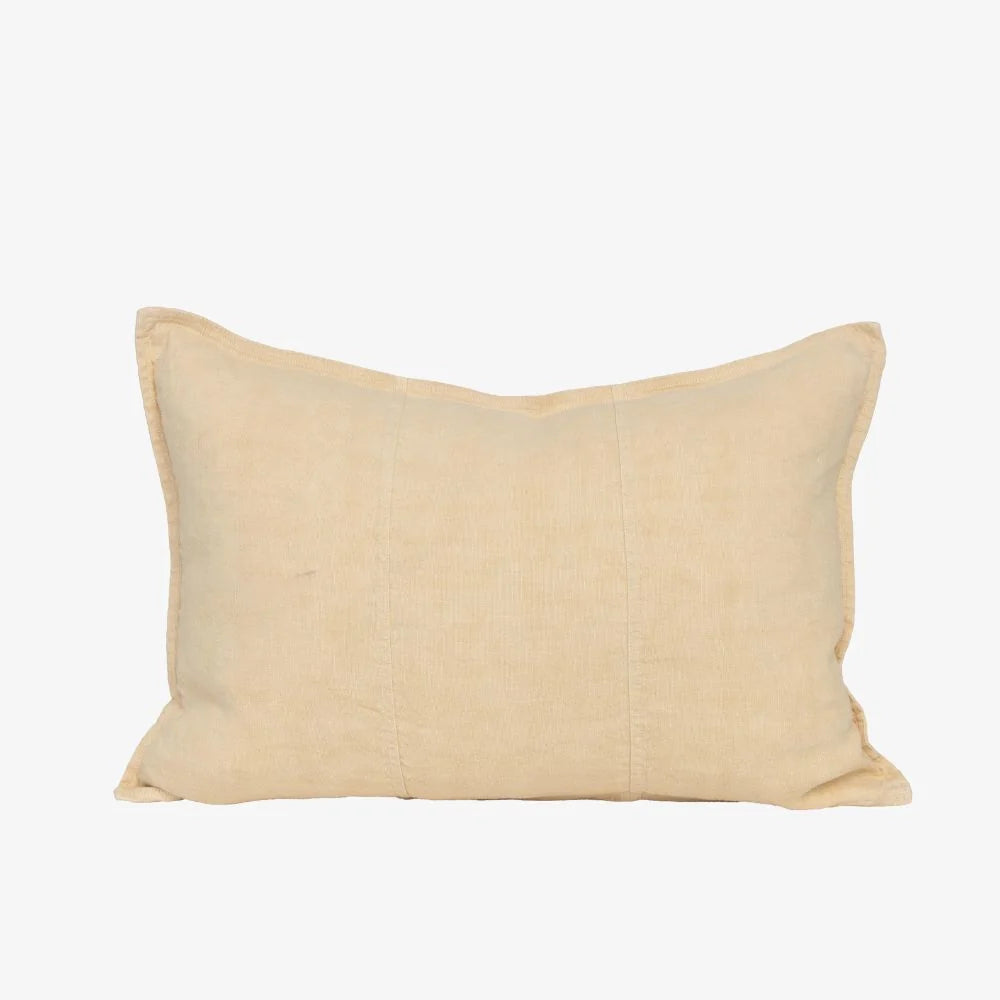 A rectangular beige linen lumbar pillow with a subtle vertical stitched seam, shown against a plain white background.