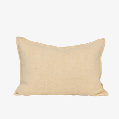 A rectangular beige linen lumbar pillow with a subtle vertical stitched seam, shown against a plain white background.