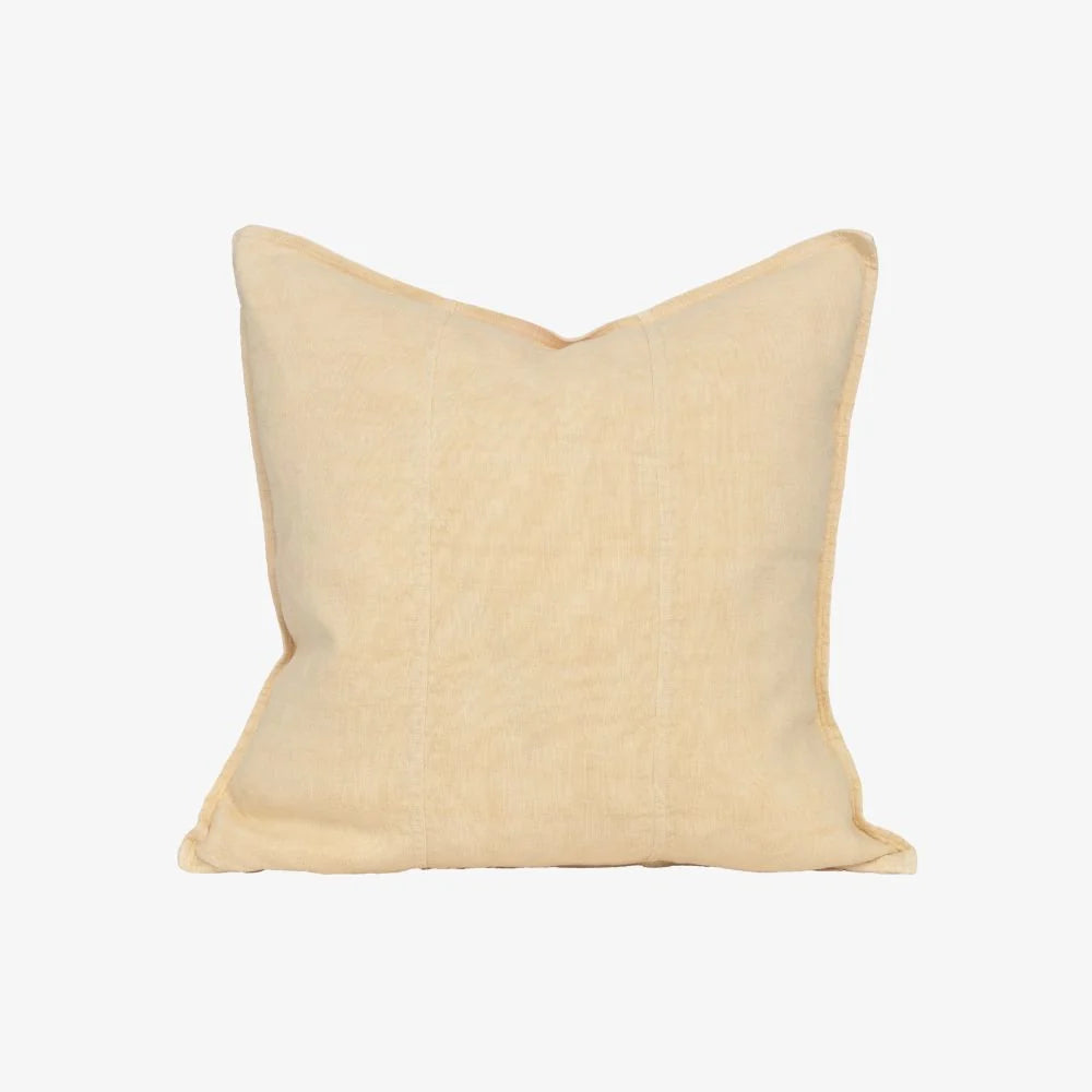 A square decorative throw pillow in a light cream or pale beige color, shown against a plain white background.