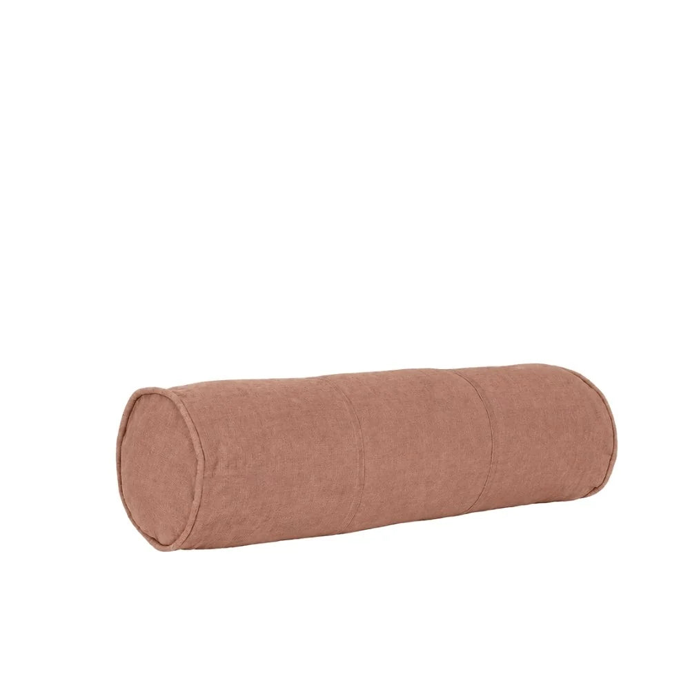 A cylindrical bolster pillow in a dusty rose or mauve color, shown against a plain white background.
