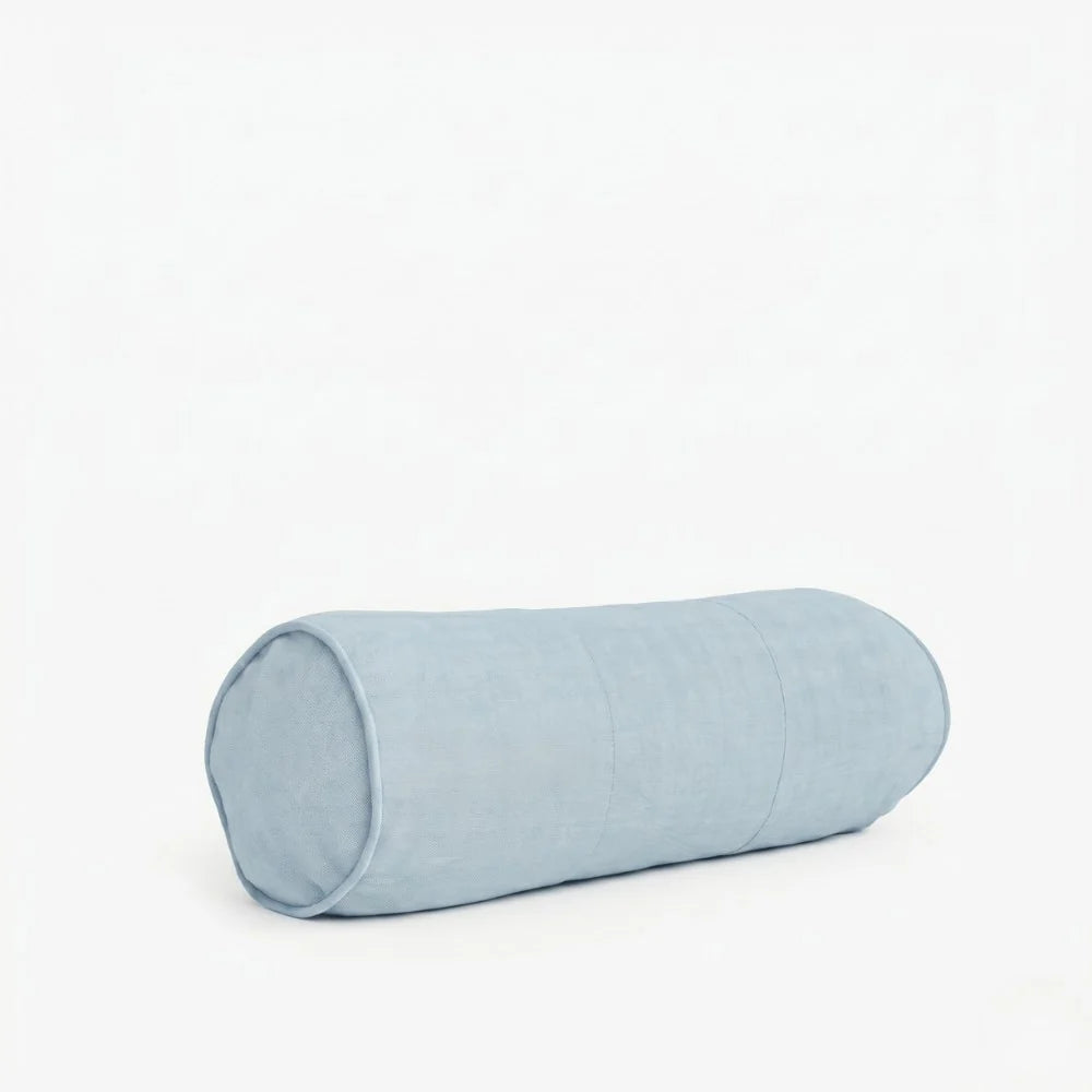 A light blue cylindrical bolster pillow with a textured linen-like fabric, shown on a clean white background.